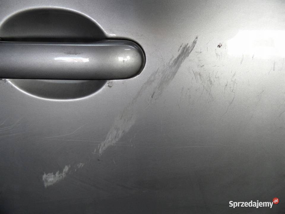 NISSAN NOTE I LIFT 10r drzwi prawy przód