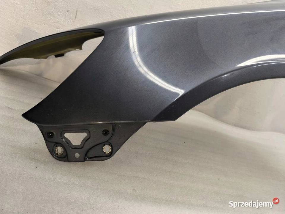 BŁOTNIK LEWY PRZÓD 9153 LIFT SKODA OCTAVIA II