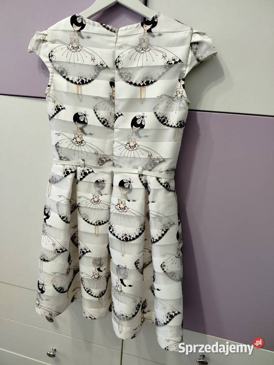 Elegancka wseslna sukienka rozmiar 146 Adamów