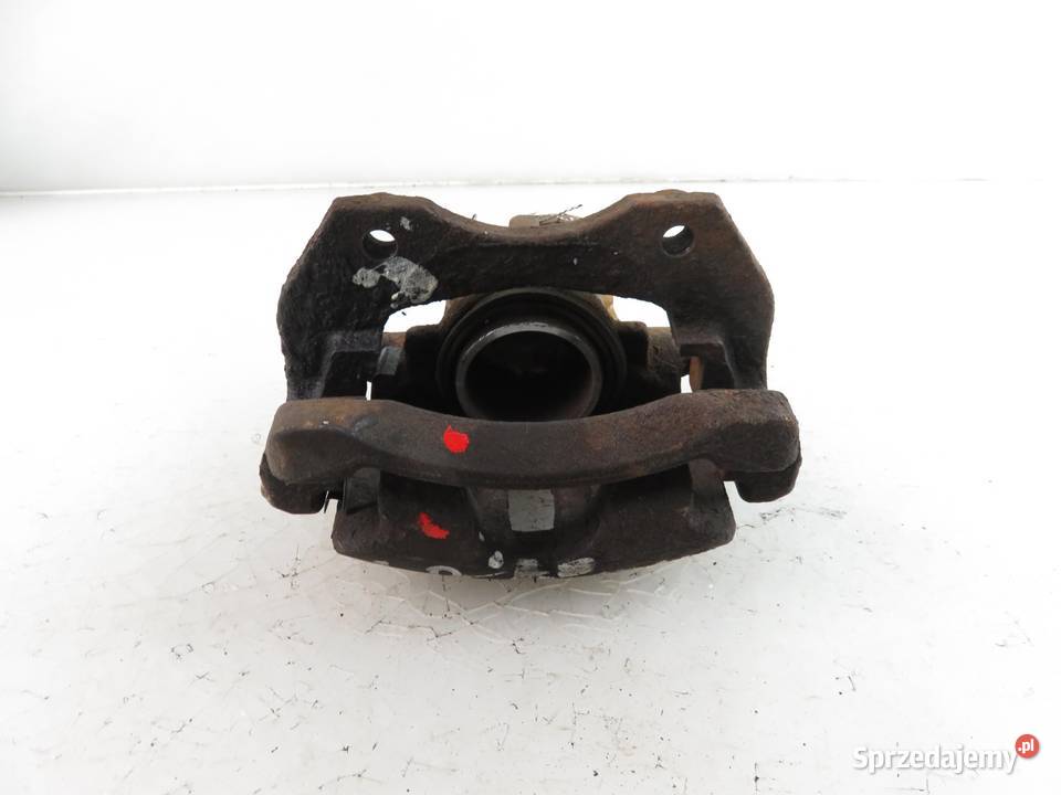 ZACISK LEWY PRZÓD NISSAN PRIMERA P11 20 16V osobowe