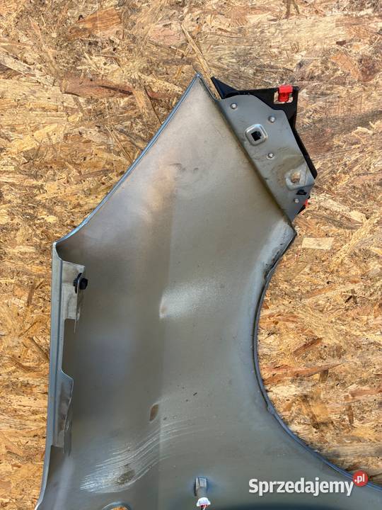 Opel Corsa D kod lak Z21C BŁOTNIK PRZÓD PRZEDNI Słowikowo