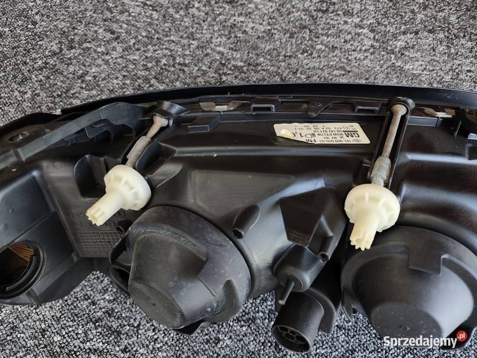 Reflektor Opel Omega LIFT H1 Hella Europa lampa Lampy przednie