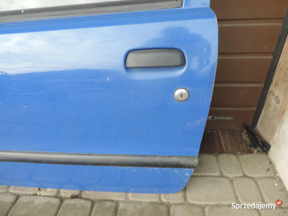 FIAT SEICENTO DRZWI LEWE PRZEDNIE KOLOR 451A osobowe Nowy Sącz