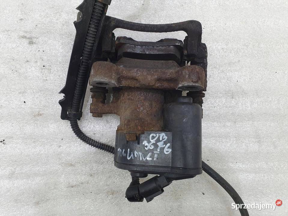 ZACISK HAMULCOWY LEWY TYŁ VW TIGUAN 20TDI 5N osobowe