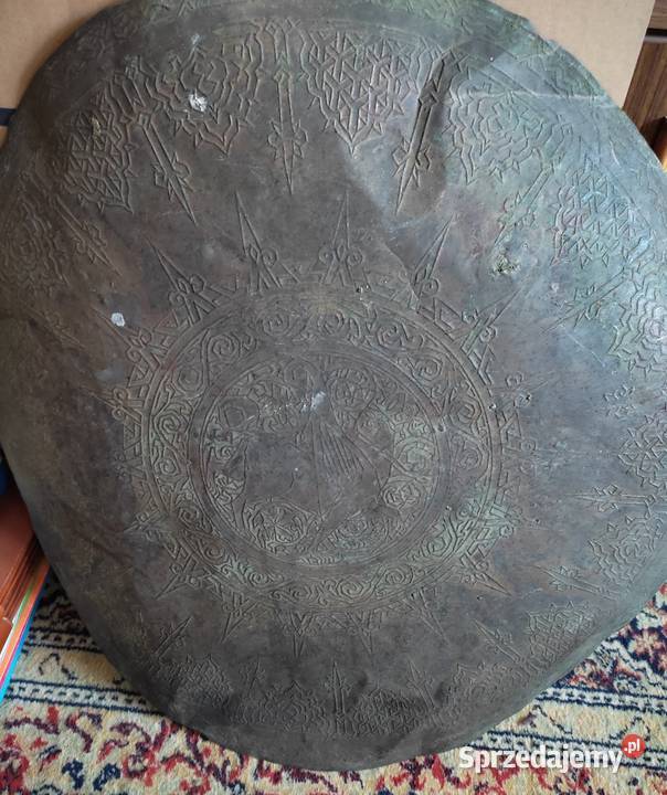 Wizerunek Gryfa z ludzką głową w koronie Białystok