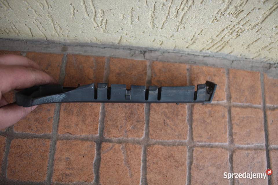 ŚLIZG ZDERZAKA PRAWY PRZÓD AUDI A6 C5 4b0807284b Części montażowe wielkopolskie