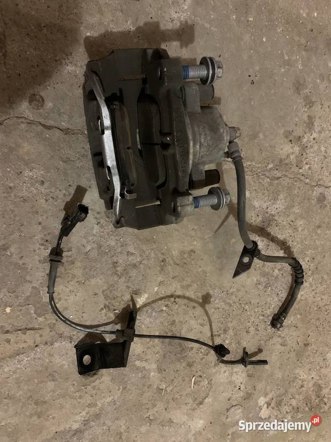 Zacisk prawy przód Ford Fusion Mondeo mk5 mkV osobowe Układ hamulcowy