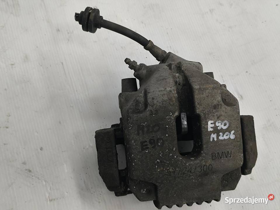 ZACISK LEWY PRZÓD BMW E90