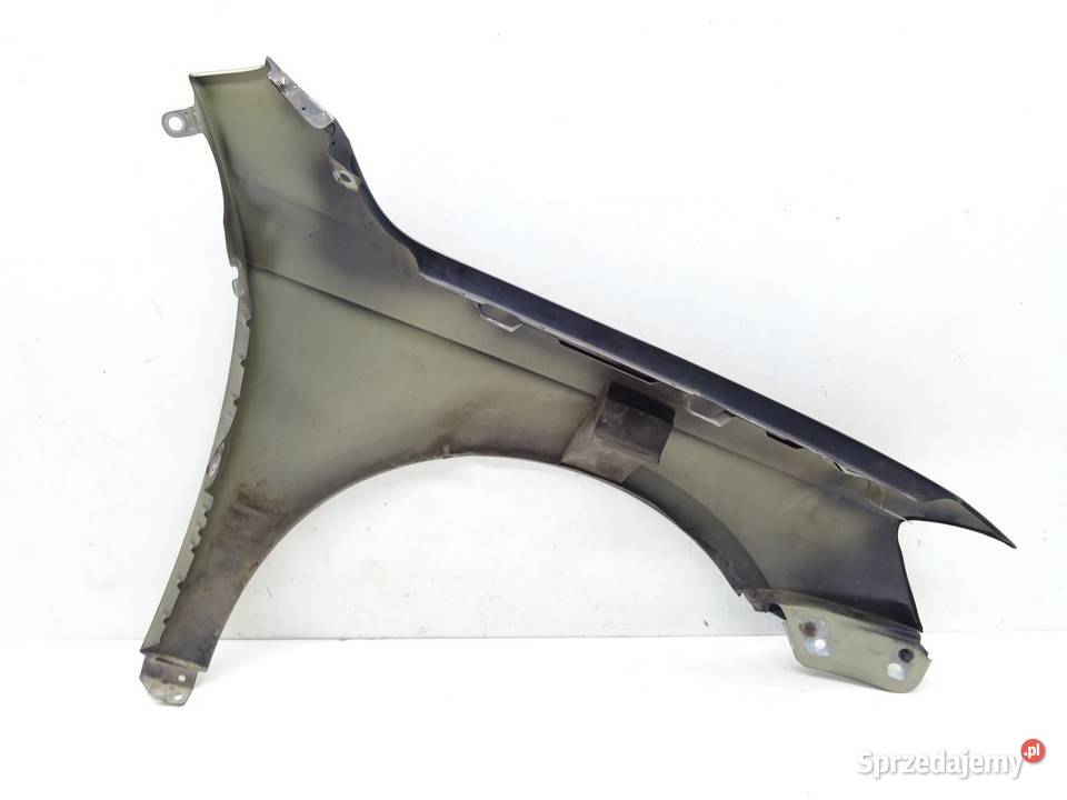 BŁOTNIK PRZÓD LEWY VW PASSAT B7 Kombi 1015