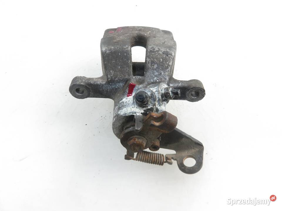 ZACISK LEWY TYŁ RENAULT SCENIC II 15 dCi