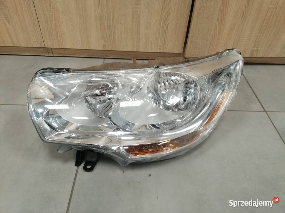 Citroen C4 b7 reflektor lewy przód Kozubszczyzna