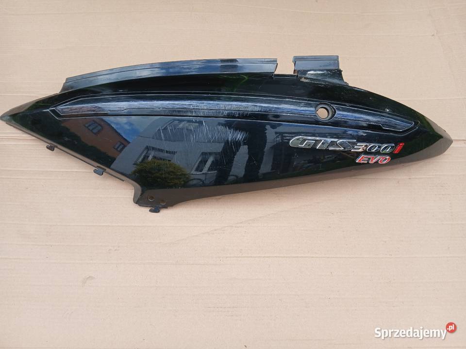 Zadupek lewy Emblematy Sym Gts 300i Skwierzyna