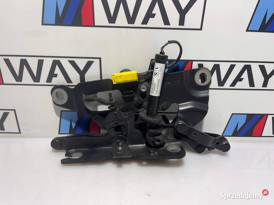 BMW F10 F11 ZAWIAS MASKI LEWY NABÓJ ORYGINAŁ B90