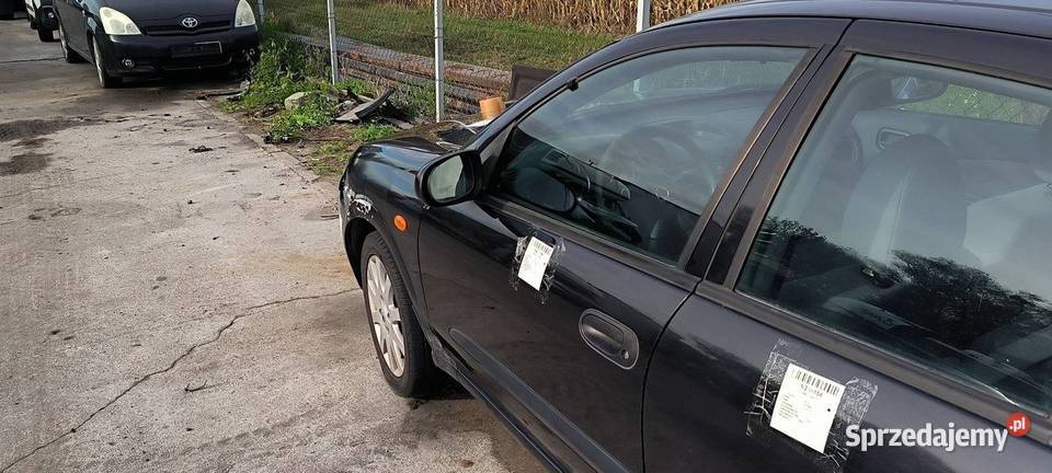 DRZWI LEWE PRZÓD NISSAN ALMERA osobowe Lipno