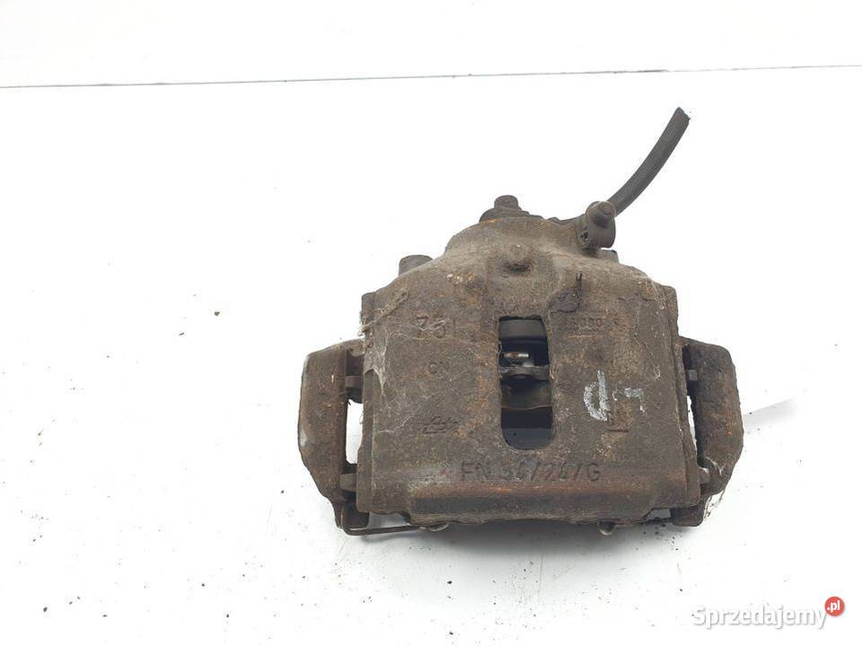 ZACISK HAMULCOWY PRZÓD LEWY SAAB 900