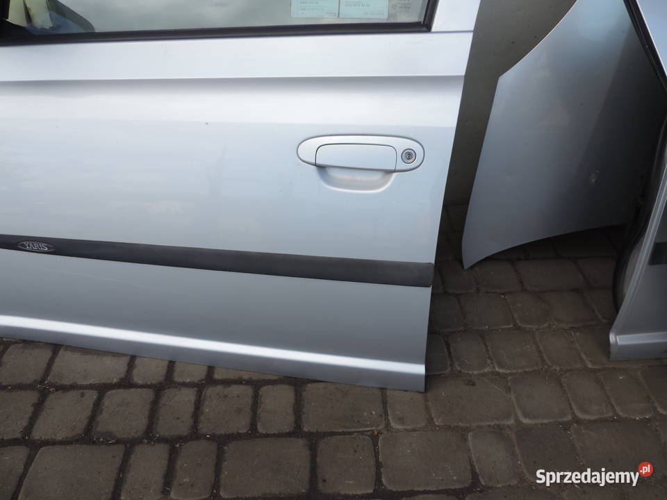 TOYOTA YARIS I 5D FL DRZWI LEWE LEWY PRZÓD 1E7 osobowe Nowy Sącz sprzedam