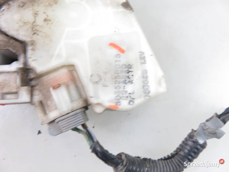 ZAMEK LEWY PRZEDNI NISSAN NAVARA D22 805525P013