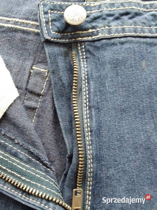 Spodnie damskie jeansowe 44 z elastanem w pasie Rewal