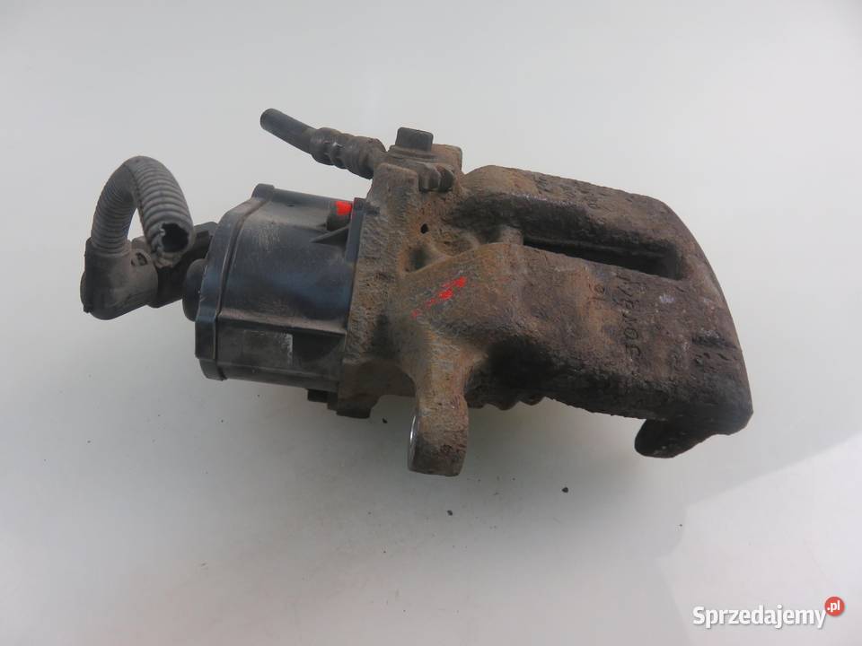 ZACISK LEWY TYŁ VW PASSAT B7 20 TDI osobowe małopolskie sprzedam