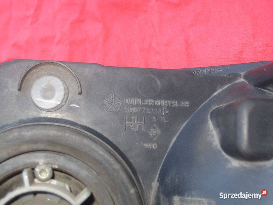 dodge ram 0205r lampa przód prawa 55077120ag osobowe Rakoniewice