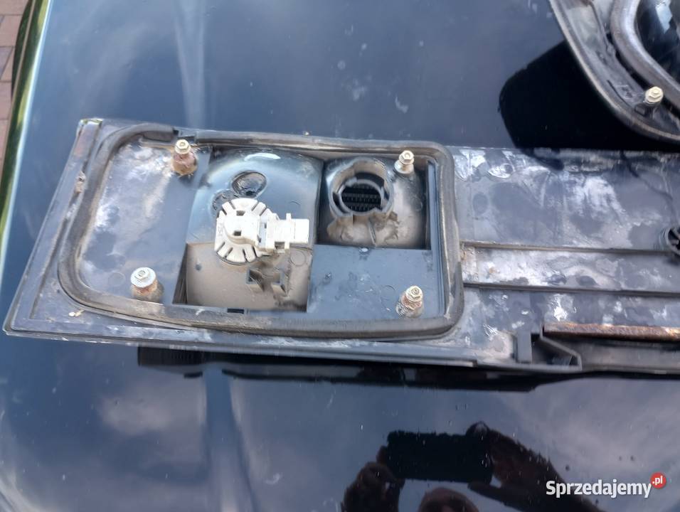 Audi 100 A6 S6 S4 Blenda lampy Black Hella osobowe Lampy tylne