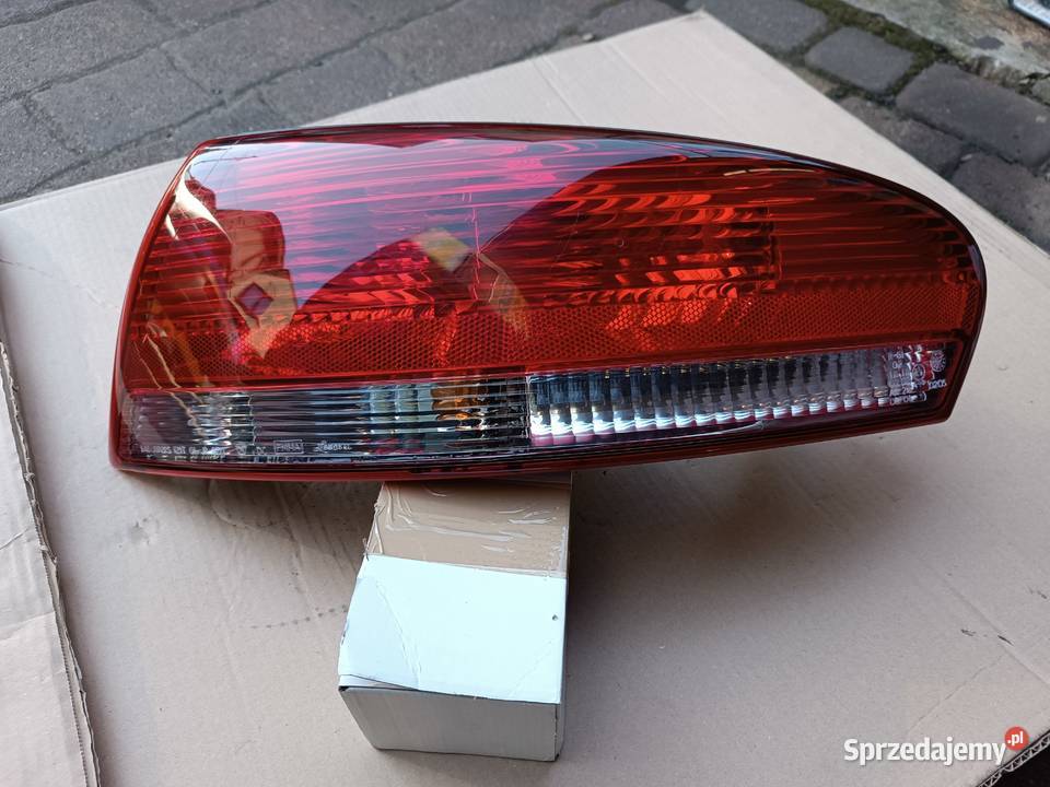 Chrysler Sebring 2 II 0103 Lampa prawy tył Lampy tylne