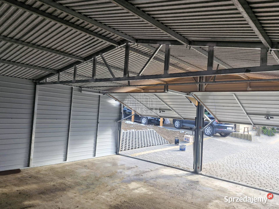 Garaż blaszany 6x65m bramy uchylne rynny dwuspad Bydgoszcz