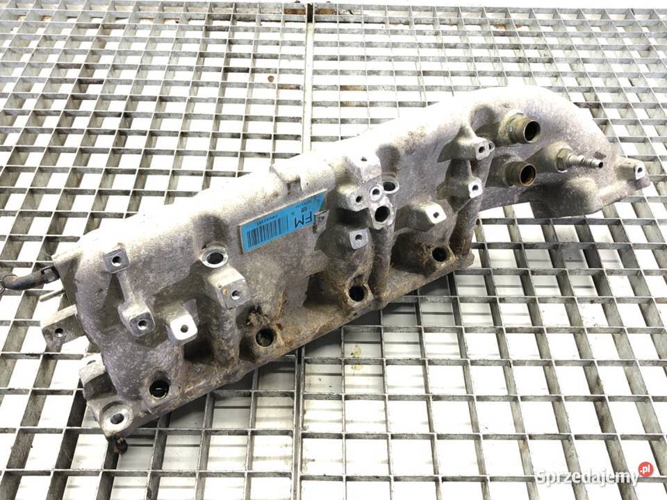 KOLEKTOR SSĄCY OPEL ASTRA J 55565246 16 180 1015 Silniki i osprzęt