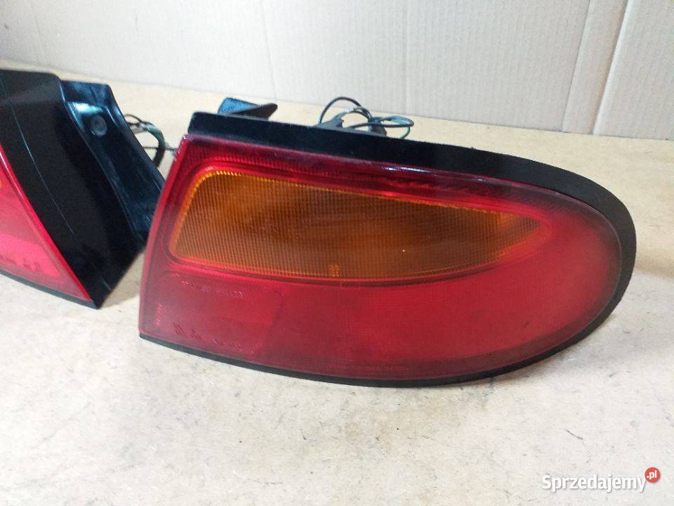 149G MAZDA 323 Lampa tylna lewa prawa Oryginał Włoszczowa