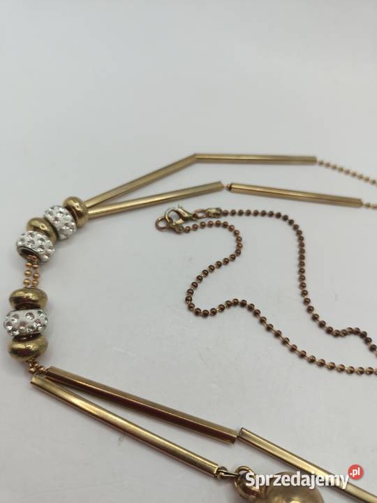 Naszyjnik z złotymi bombkami