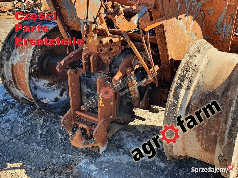 Holland TL100 części silnik skrzynia biegów Byków