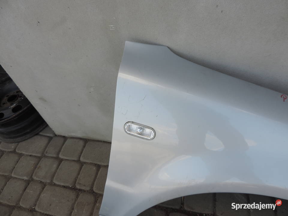 BŁOTNIK PRAWY PRZÓD VW PASSAT B5 LB7Z