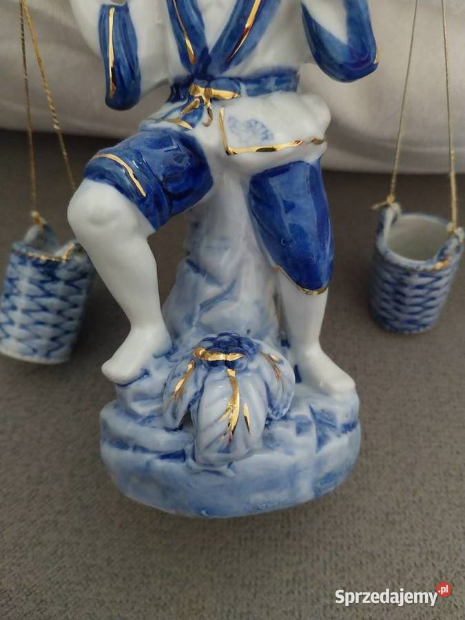 Porcelanowa figurka azjatyckiego rybaka