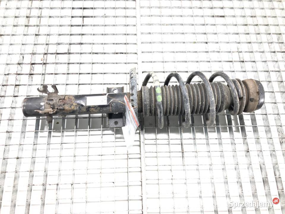 AMORTYZATOR LEWY PRZÓD ZE SPRĘŻYNĄ SKODA RAPID