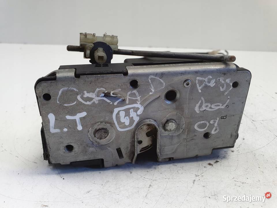 Opel Corsa D ZAMEK DRZWI lewy tył kierowcy Rudka