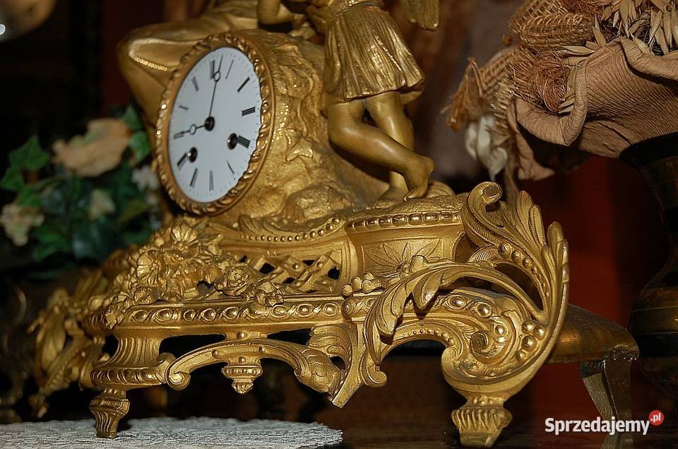 B duży zegar kominkowy anił z dzieckiem Antyki Machnacz