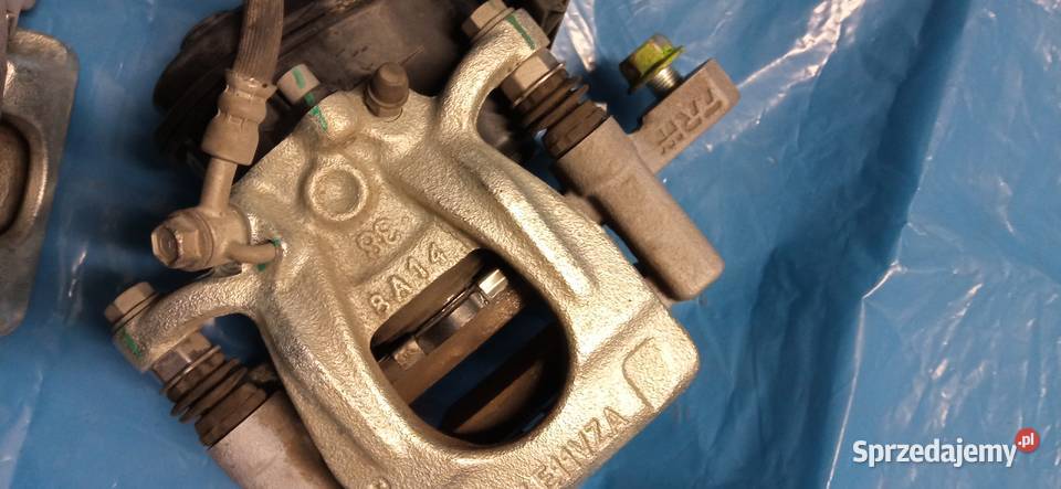 NISSAN LEAF II ZE1 JARZMO zacisk hamulcowy Piła