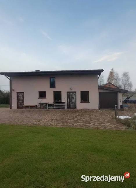 Działka z domem i budynkiem gospodarczym