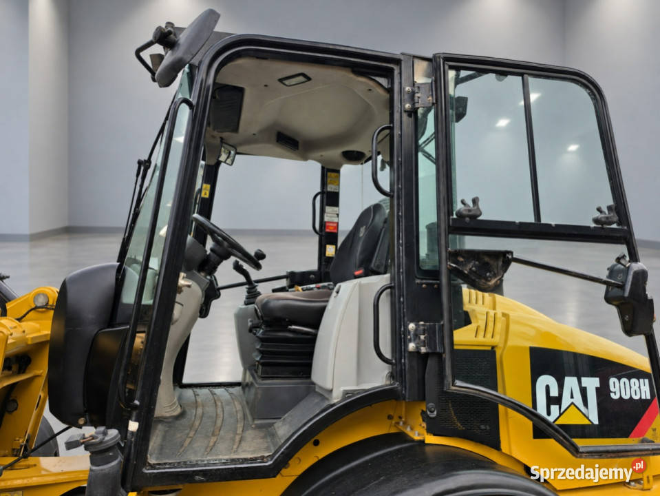 kompaktowa Cat 908H2 Caterpillar 908H Ładowarka 7000h Koparko ładowarki Skępe