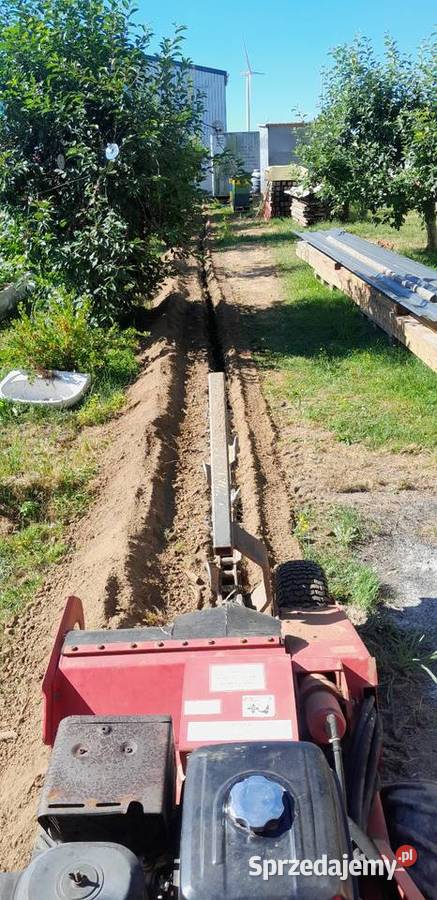 Wykopy liniowe usługi koparką łańcuchową Grodków usługi budowlane