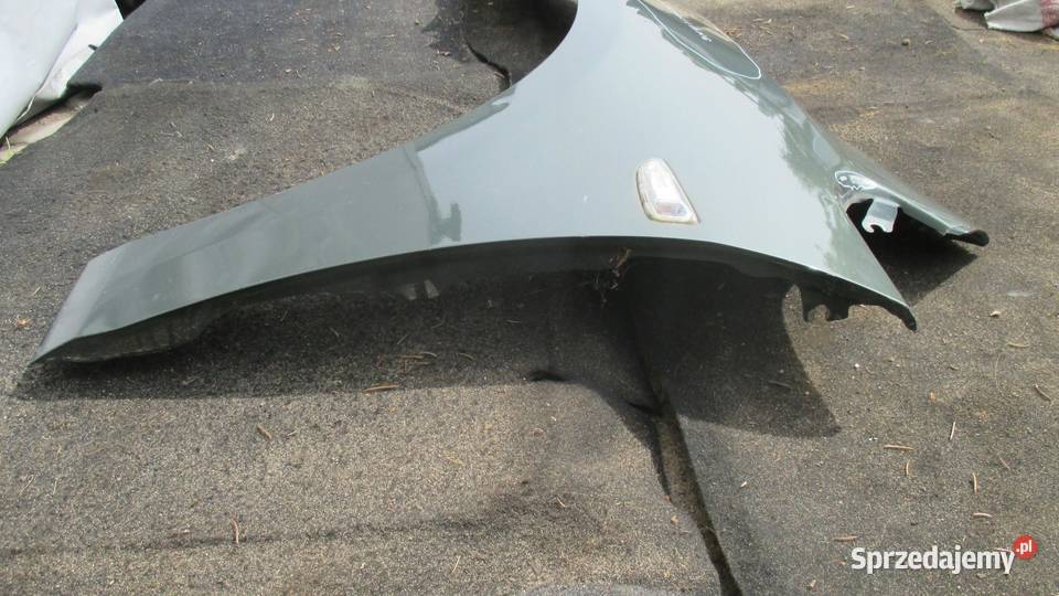 OPEL ASTRA J IV 10r błotnik lewy przód