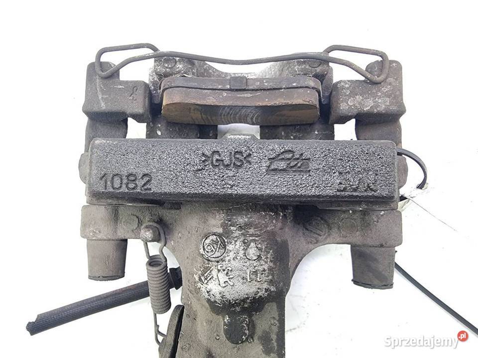 ZACISK HAMULCOWY TYŁ LEWY PEUGEOT 308 967074048A
