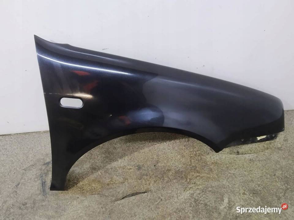 BŁOTNIK PRAWY PRZÓD LC9Z VW Volkswagen Golf IV Rok produkcji 1998