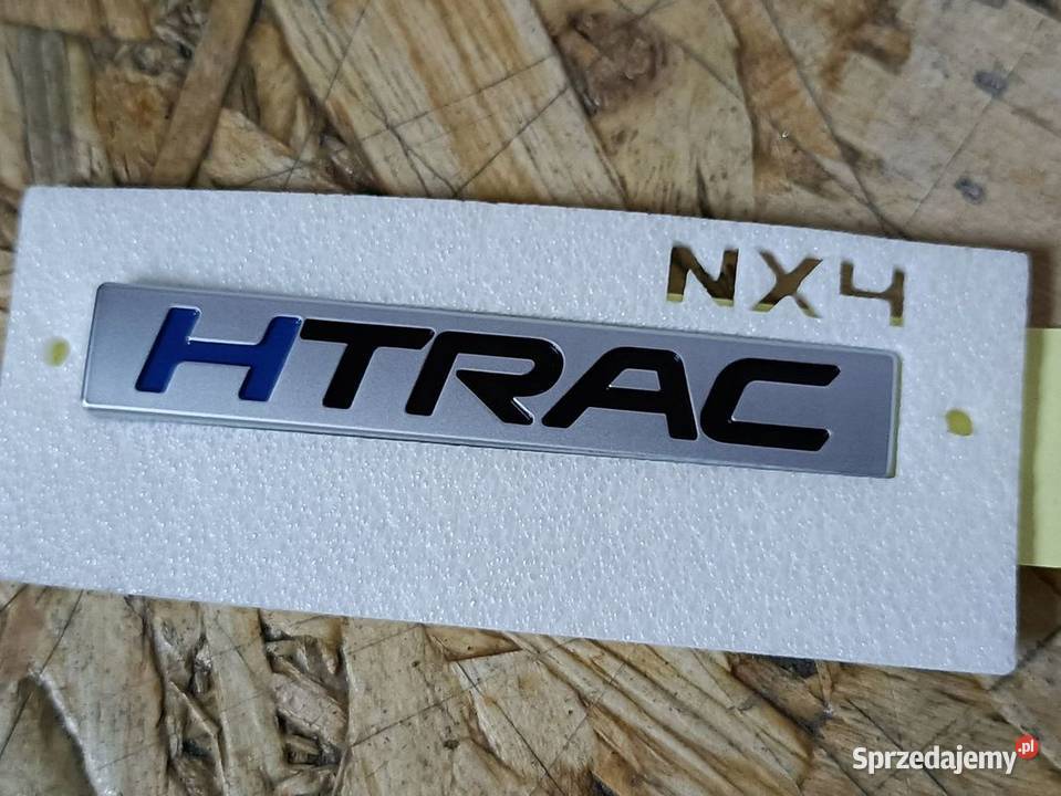 HYUNDAI TUCSON NX4 MK4 22 EMBLEMAT BAGAŻNIKA wielkopolskie