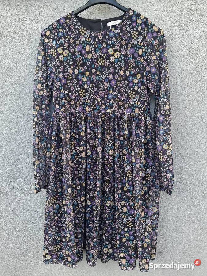 Sukienka w kwiaty Reserved