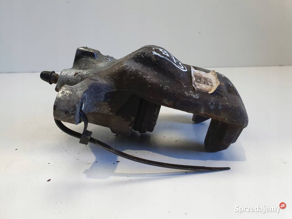 Toyota Corolla XII E21 PRZEDNI ZACISK HAMULCOWY Janów
