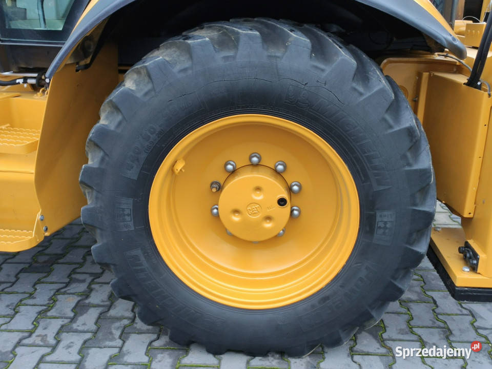 na równych kołach Caterpillar 444E Premier świętokrzyskie Widełki