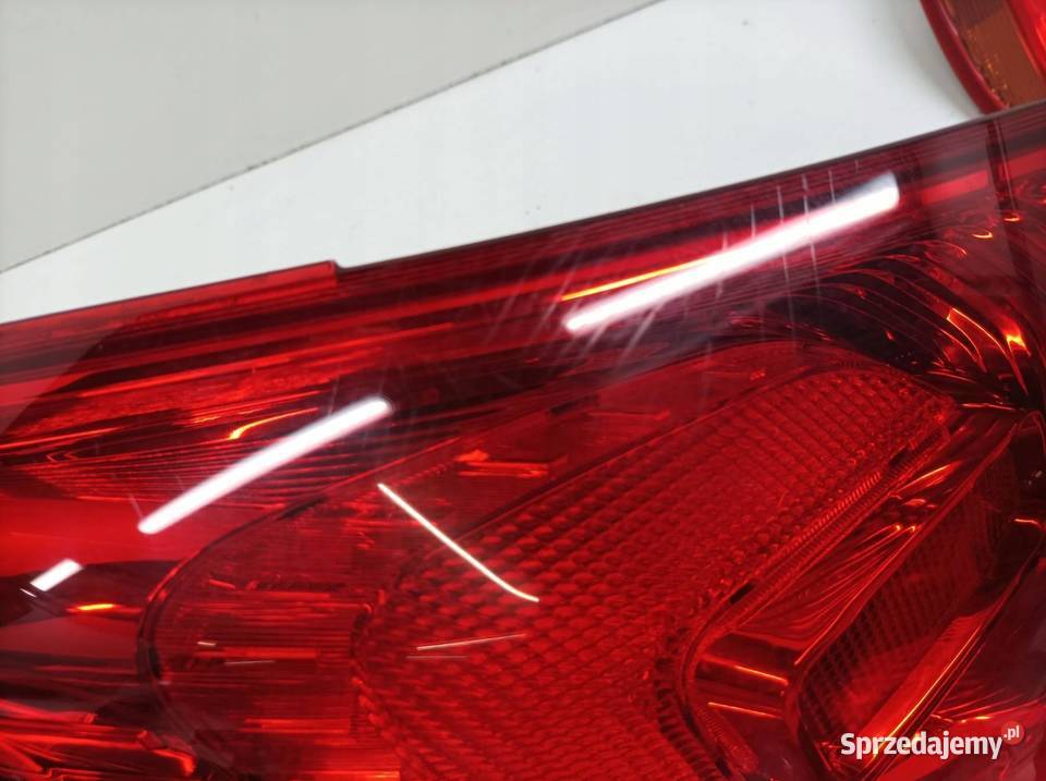 LAMPA TYŁ LEWA KOMBI 13282242 Opel Astra IV 2009