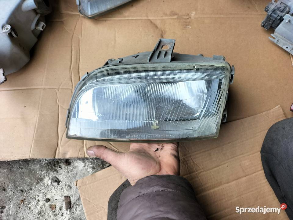 FIAT PUNTO 1 LAMPA PRZÓD PRZEDNIA LEWA Kamień-Kolonia
