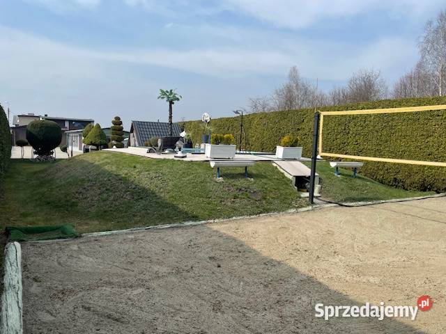 Dom z warsztatem serwisu ogumienia i basenem Książenice